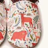 A close up of the Inch Blue stag & friends shoes available at Babipur showing a closer look at the stag and friends design