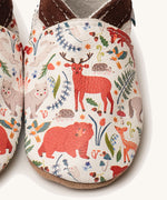 A close up of the Inch Blue stag & friends shoes available at Babipur showing a closer look at the stag and friends design