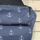 A close up of the anchor design an hood detail from the integra navy anchor baby carrier available at Babipur.