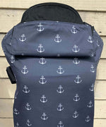 Integra anchor carrier available at a Babipur a navy coloured carrier with a all over anchor print. Features a small hood for head protection.