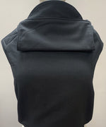 Integra plain black baby carrier available at a Babipur. Features a small hood for head protection.