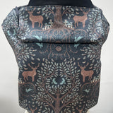 Integra forest tree carrier available at a Babipur a dark coloured carrier with a beautiful reindeer in a forest design. Features a small hood for head protection.