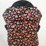 Integra Gallica rose carrier available at a Babipur a dark coloured carrier with a vintage rose design. Features a small hood for head protection.