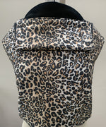 Integra leopard design baby carrier available at a Babipur. Features a small hood for head protection.