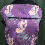 Integra mermaid and unicorns carrier available at a Babipur a purple coloured carrier with a beautiful mermaid and unicorn design. Features a small hood for head protection.