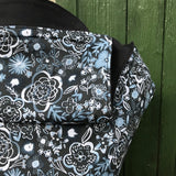 A close up of the Integra Copenhagen flower baby carrier available at a Babipur 