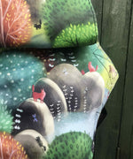 A close up of the sketch style forest design on the Integra forest glade baby carrier available at Babipur.