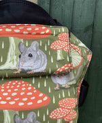 A close up of the vintage mouse design and hood detail on the Integra shelter baby carrier available at Babipur.