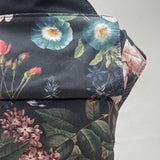 A close up of the Integra vintage summer baby carrier available at a Babipur 