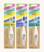 Three Jack N' Jill soft bristled children's toothbrushes shown in their  colourful packing. There are three different designs. 