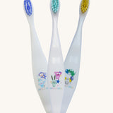Three Jack N' Jill soft bristled children's toothbrushes. There are three different designs. 