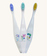 Three Jack N' Jill soft bristled children's toothbrushes. There are three different designs. 