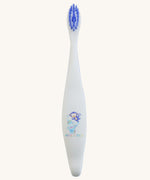 A Jack N' Jill soft bristled children's toothbrush. This toothbrush has purple bristles and features monkey and unicorn characters on it.