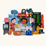 Jig-So Cymraeg Cartref. A Welsh Home themed wooden jigsaw puzzle with painted pieces. A selection of Welsh Jigsaw puzzles from Alphabet Jigsaws are available at Babipur.