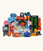 Jig-So Cymraeg Cartref. A Welsh Home themed wooden jigsaw puzzle with painted pieces. A selection of Welsh Jigsaw puzzles from Alphabet Jigsaws are available at Babipur.