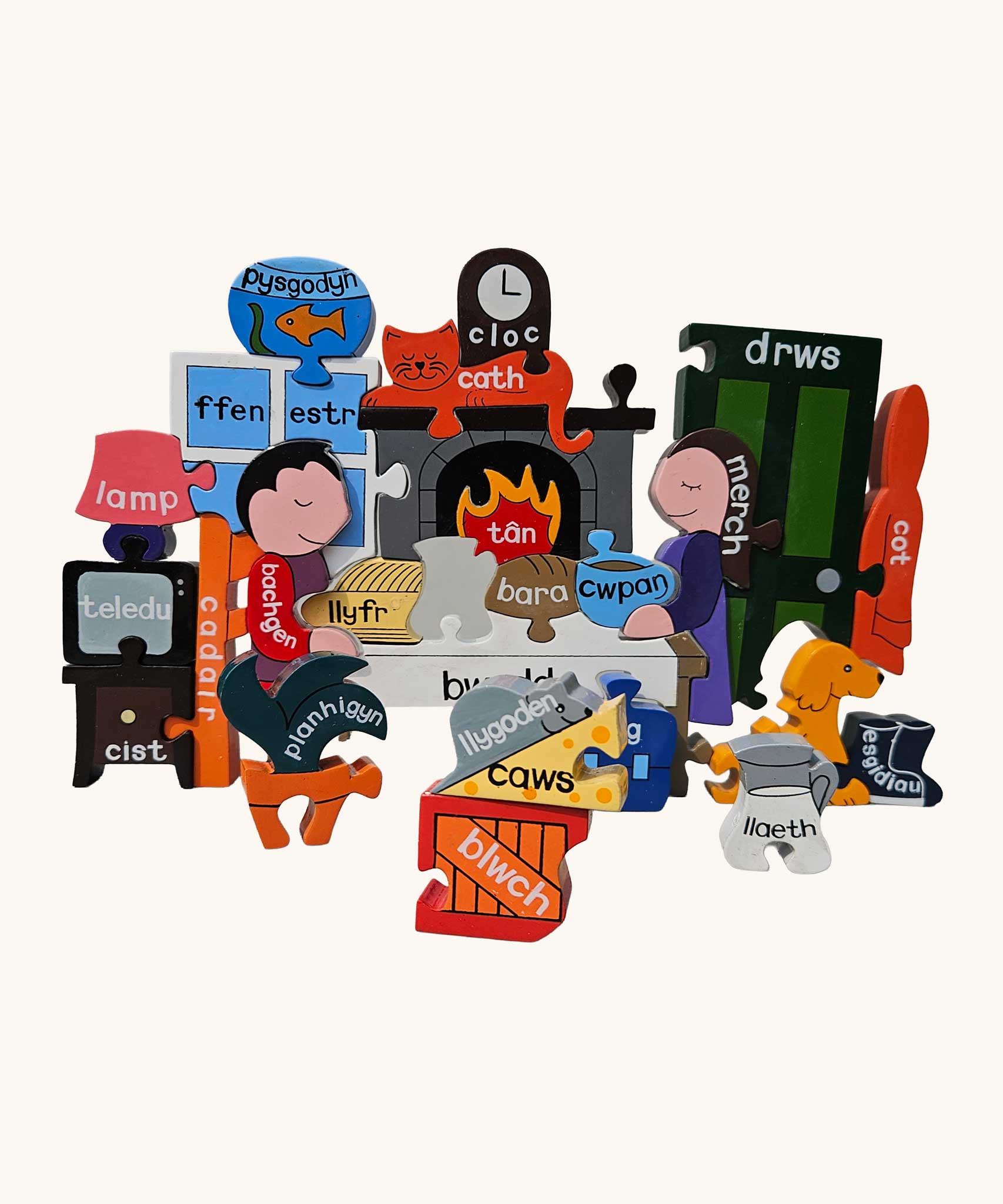 Jig-So Cymraeg Cartref. A Welsh Home themed wooden jigsaw puzzle with painted pieces. A selection of Welsh Jigsaw puzzles from Alphabet Jigsaws are available at Babipur.