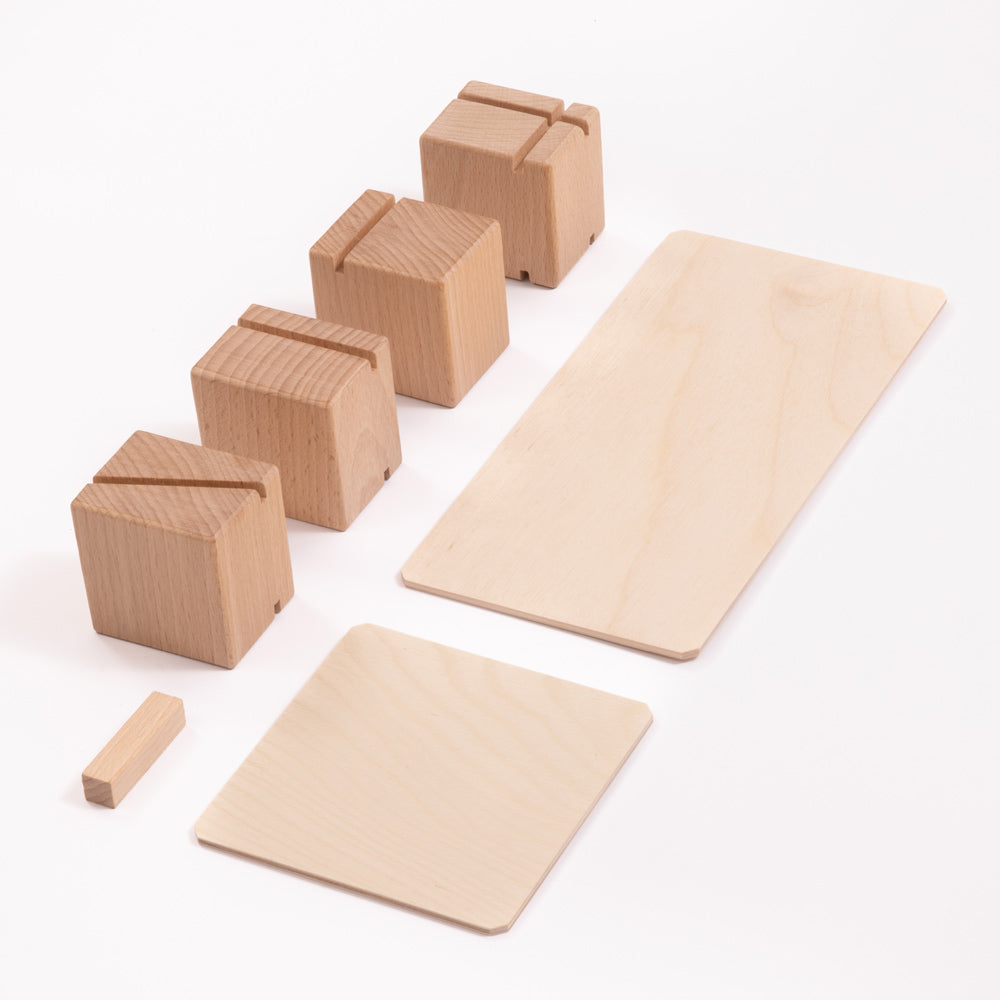 Close up of the Just Blocks eco-friendly smart lines shape set laid out on a white background