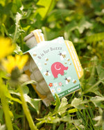 Close up of a Kabloom x Babipur 'B is for Buzzz' in some green plants