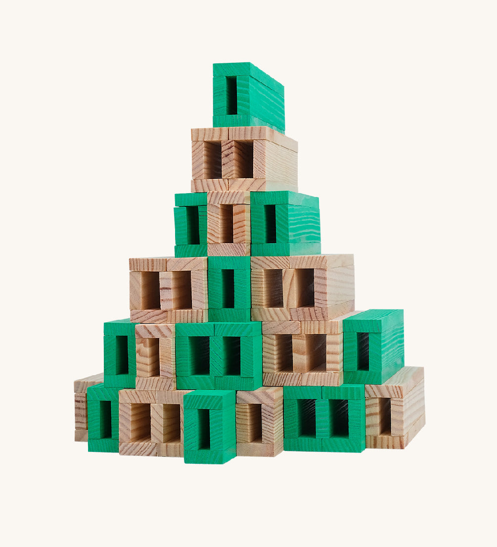 The Kapla 40 Square wooden engineering blocks set - stacked to create a pyramid structure.