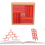 Kapla red and orange book and block set spread out on a white background