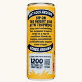 Back of the Karma organic tropikool mango & passionfruit soda can, showing Fairtrade ingredients and rainforest reforestation projects by Karma.