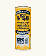 Back of the Karma organic tropikool mango & passionfruit soda can, showing Fairtrade ingredients and rainforest reforestation projects by Karma.