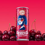 Can of Karma Drinks Cherry Lee organic cherry soda displayed with fresh cherries, showcasing its natural cherry flavour and Fairtrade certification.