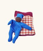 Kathe Kruse tiny organic cotton Waldorf baby doll with a gingham sleeping bag.