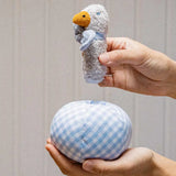 Käthe Kruse Ebba duck soft toy rattle and ball. Small duck wearing a blue and white check bowtie that can be placed inside a matching ball. 