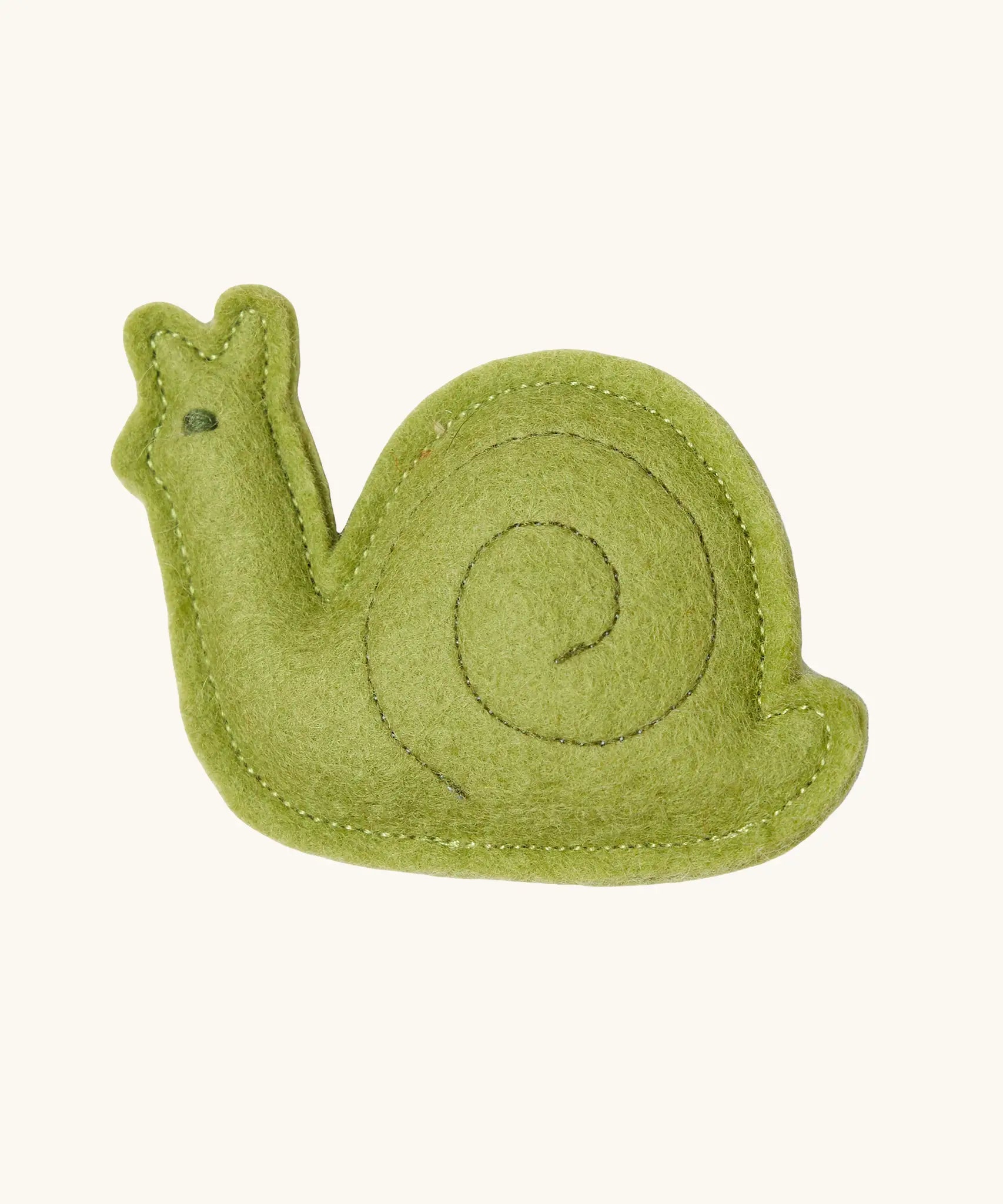 Green felt snail that comes with the Käthe Kruse Waldorf doll Elsa.