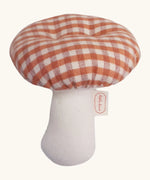 A Kathe Kruse mushroom soft grabber toy. Showing a red gingham cap and white stem