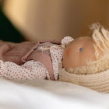 Käthe Kruse Waldorf doll Hannah placed in a laying position. 