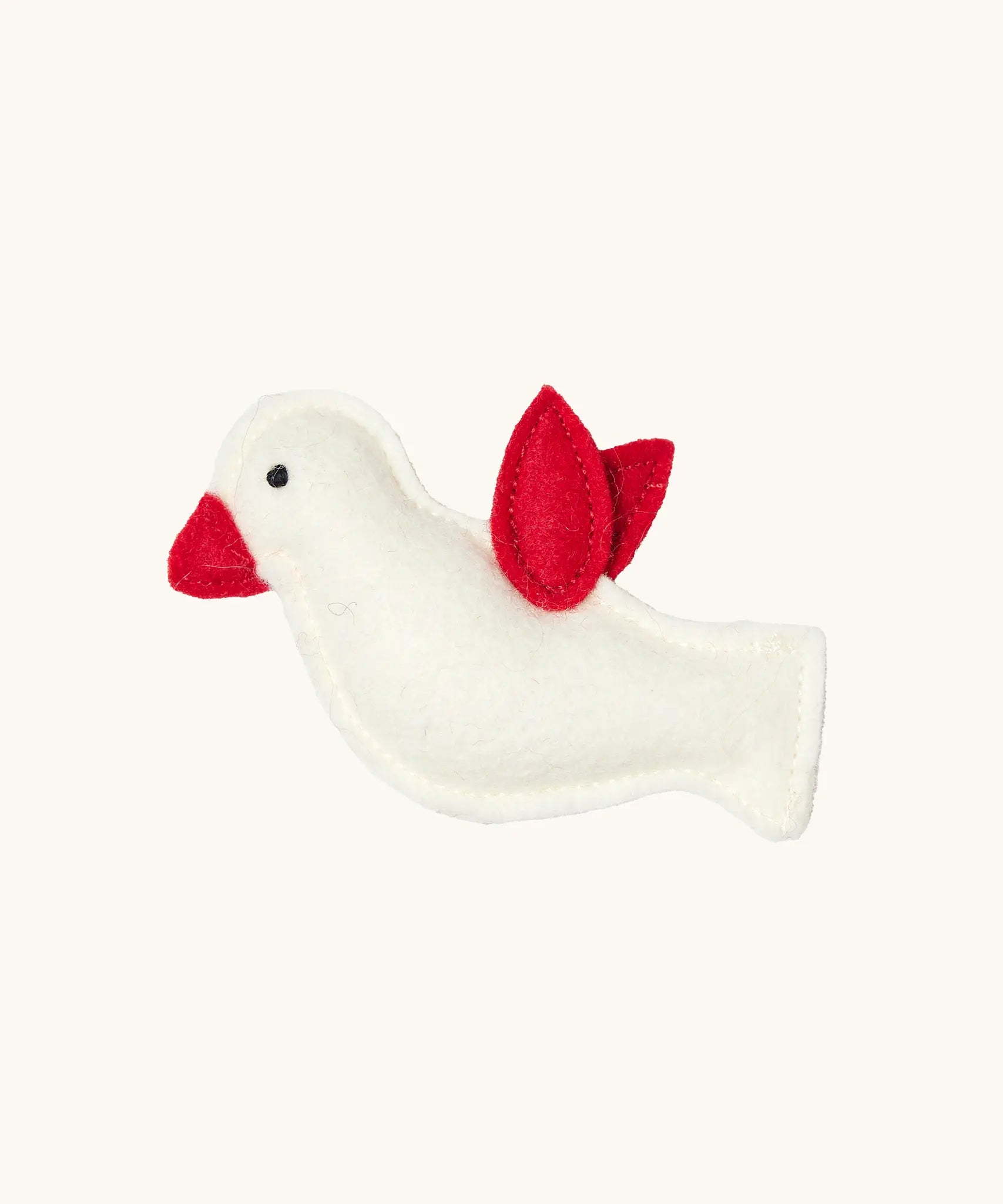 The white felt bird that comes with the Käthe Kruse Waldorf doll Tilda. 
