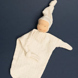 Käthe Kruse small Waldorf Imp doll baby comforter in natural white made with cotton muslin with one arm folded in.