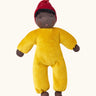 Kathe Kruse Saffron nana waldorf doll with yellow towelling outfit, red hat and dark skin