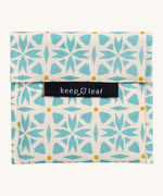 Keep Leaf large baggie in geo design. A cream colour organic cotton pouch for food with light blue geo shapes printed all over. Features a velcro lid for easy fastening