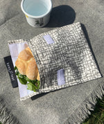 Keep Leaf large baggie in mesh design outside on a blanket with a sandwich inside the pouch for size reference