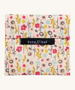 Keep Leaf large baggie in bloom design. A cream colour organic cotton pouch for food with cute flowers printed all over. Features a velcro lid for easy fastening