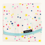 Keep Leaf food wrap in stars design. A cream colour organic cotton wrap for food with multicoloured stars printed all over and light blue trim. Features a velcro lid for easy fastening