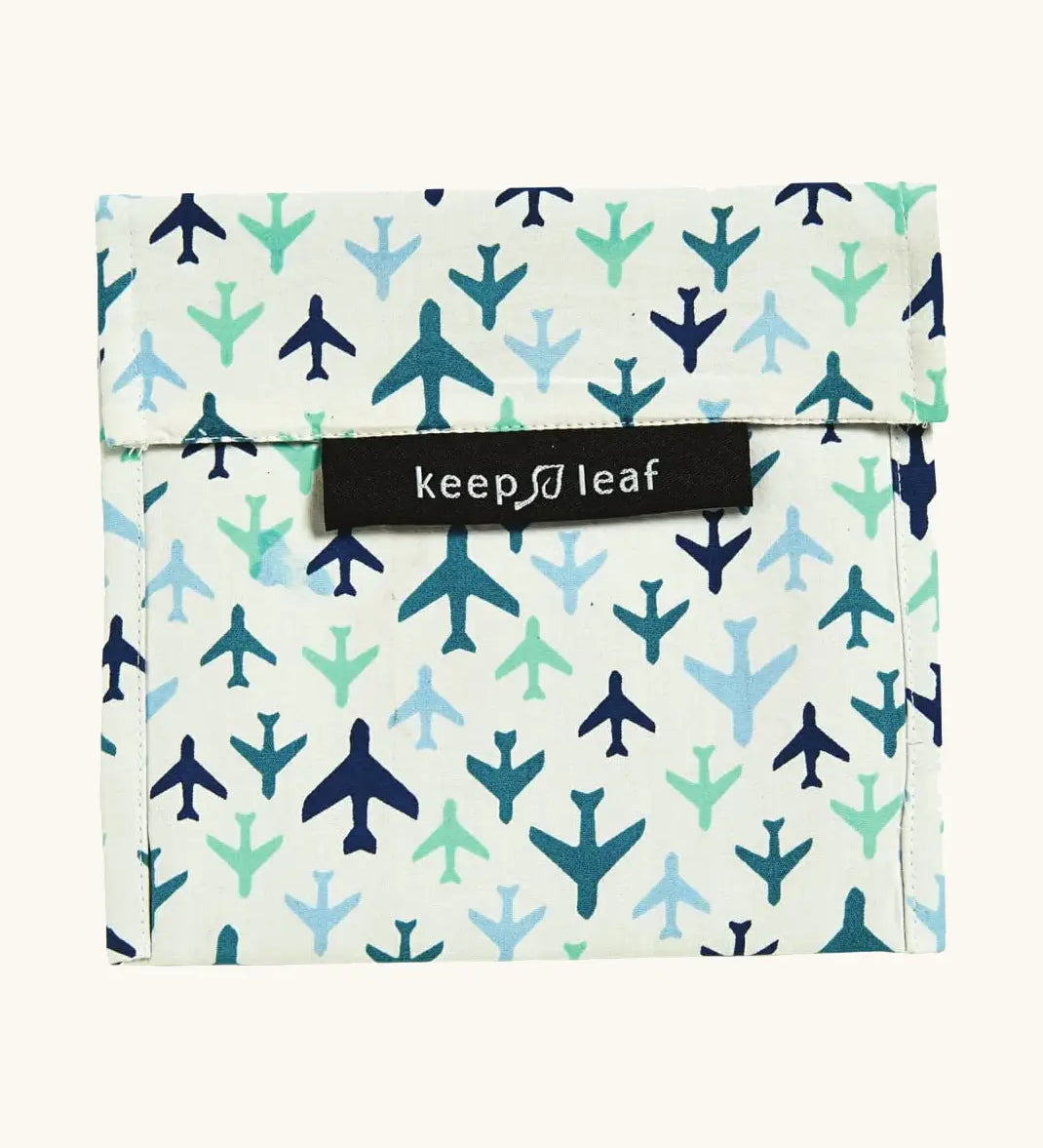 Keep Leaf large baggie with a repeating blue plane design. A cream colour organic cotton pouch for food. Features a velcro lid for easy fastening