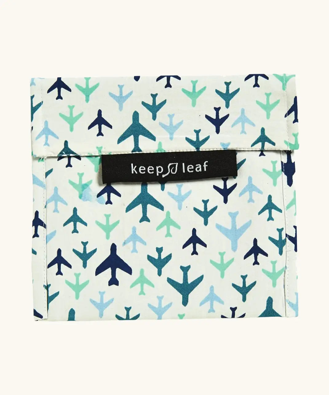 Keep Leaf large baggie with a repeating blue plane design. A cream colour organic cotton pouch for food. Features a velcro lid for easy fastening