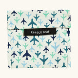 Keep Leaf large baggie with a repeating blue plane design. A cream colour organic cotton pouch for food. Features a velcro lid for easy fastening