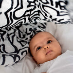  with a high-contrast black and white design crawling baby design 