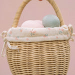 A child happily playing an egg hunt