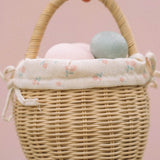A child happily playing an egg hunt