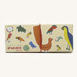 The box for the Kitpas 12-pack of rice bran wax crayons in collaboration with Ecru. It has drawings of little birds all over.