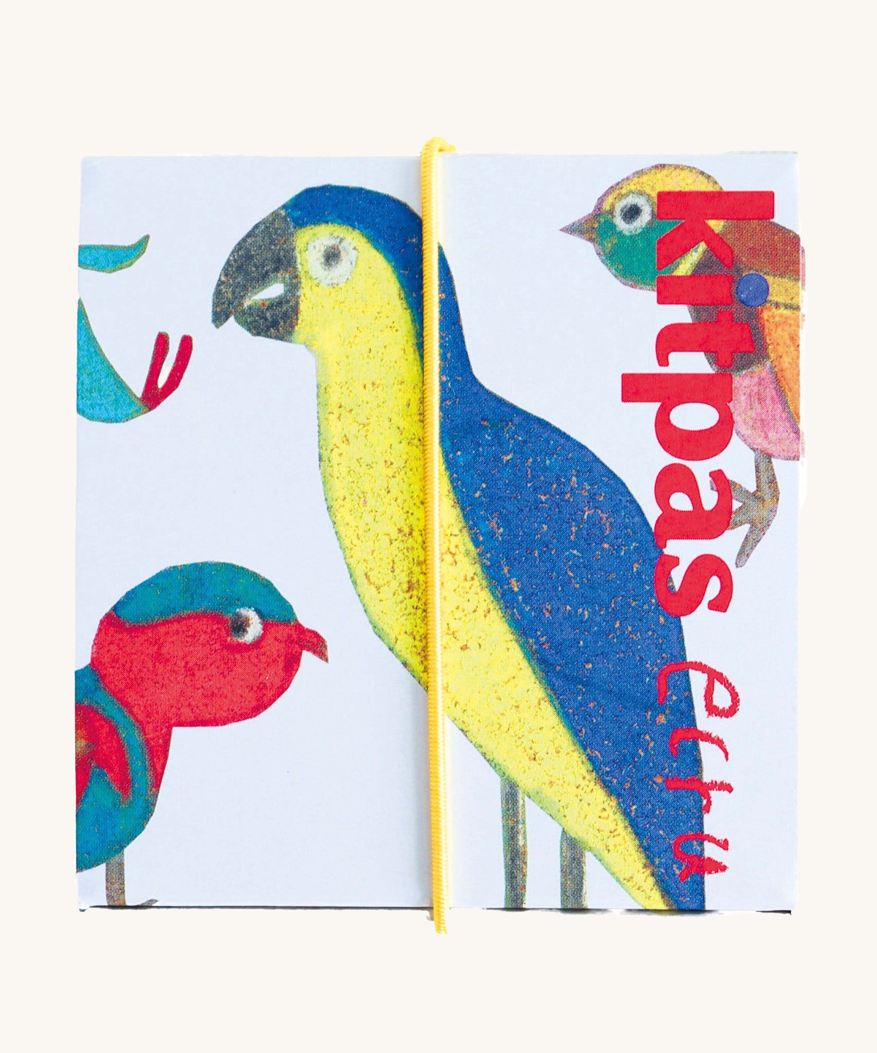 The Kitpas rice bran wax crayons six pack, with a drawing of a bird by Ecru on the box.