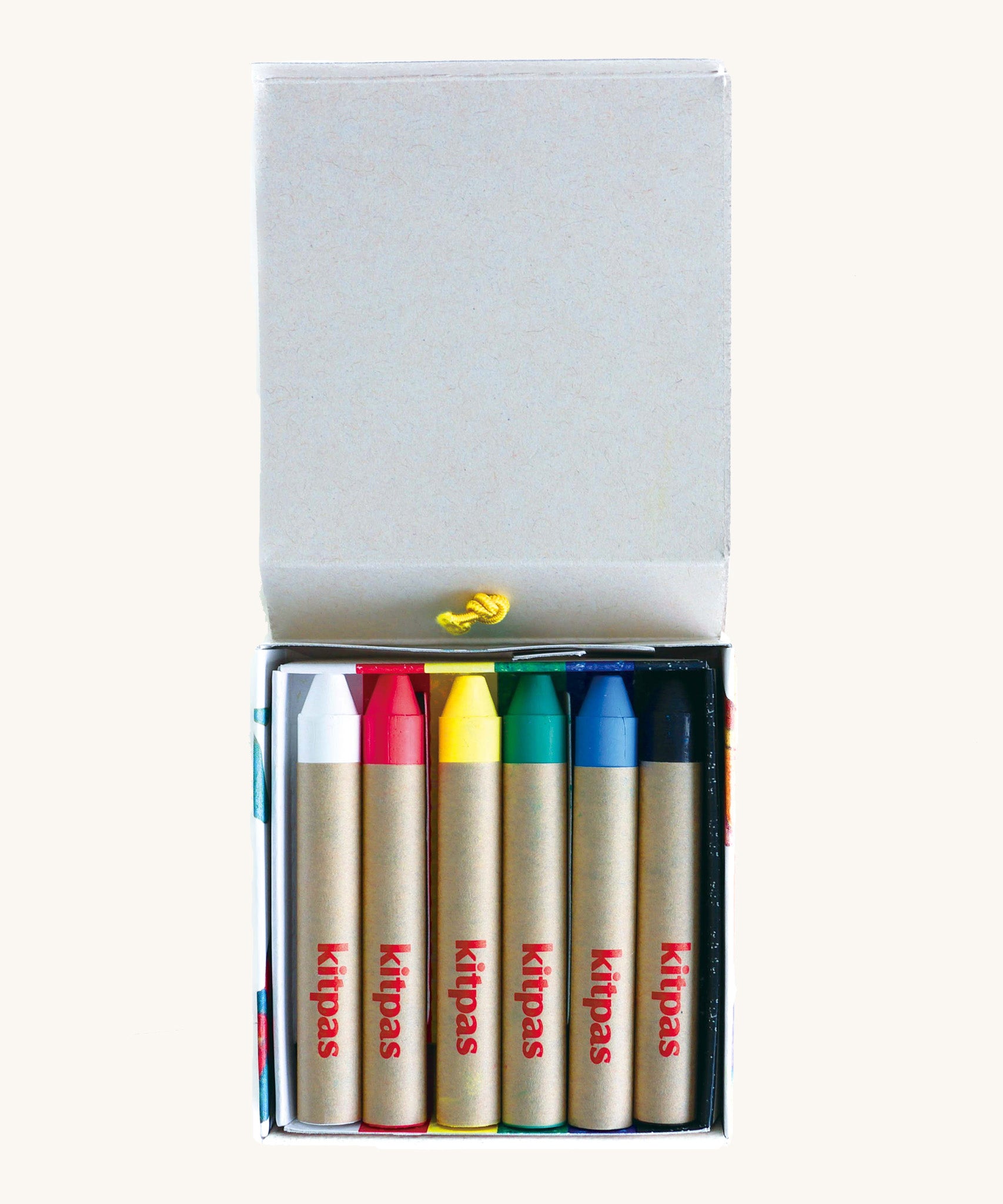 The Kitpas Bird rice bran wax crayons, in bright primary colours as well as green, white, and black.