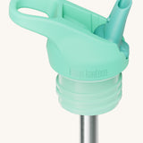 A close up of the Klean Kanteen turquoise flip sports straw cap for the rise insulated bottle showing the dark turquoise spout and small loop detail. 