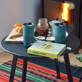 Pair of Klean Kanteen Brittany blue 16oz stainless steel rise tumblers standing on a table next to breakfast items